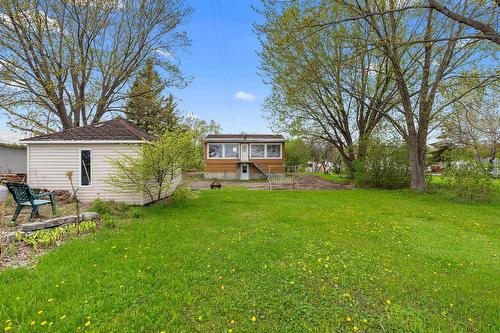 Face arrière - 7696 Boul. Ste-Anne, Château-Richer, QC - Outdoor