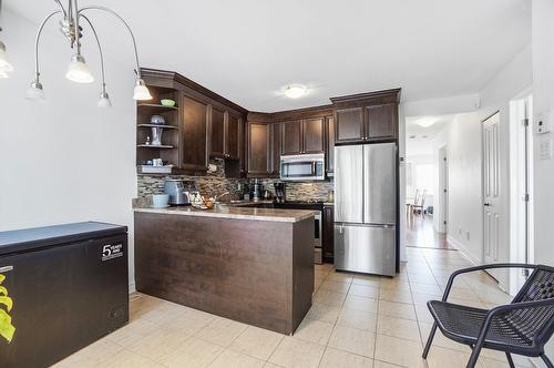Kitchen - 7936 Boul. Lévesque E., Laval (Duvernay), QC - Indoor Photo Showing Kitchen