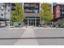 775 Academy Way Unit# 207, Kelowna, BC  - Outdoor With Balcony With Facade 