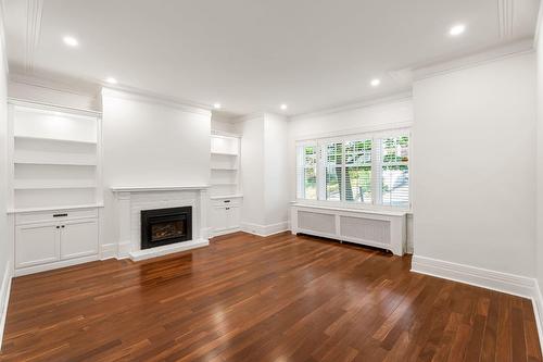Living room - 4338 Av. Westmount, Westmount, QC - Indoor With Fireplace