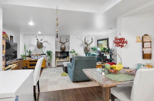 1833 Pratt Road, Kamloops, BC - Indoor Photo Showing Dining Room With Fireplace