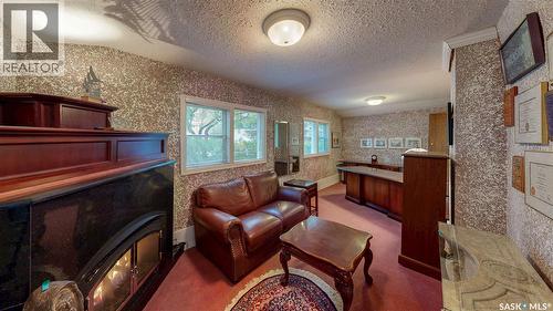 2301 15Th Avenue, Regina, SK - Indoor Photo Showing Living Room With Fireplace