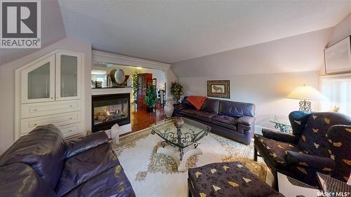 2301 15Th Avenue, Regina, SK - Indoor Photo Showing Living Room With Fireplace
