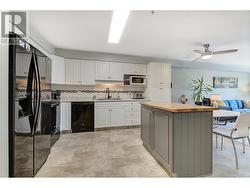 Spacious kitchen - island with butcher block counter - 