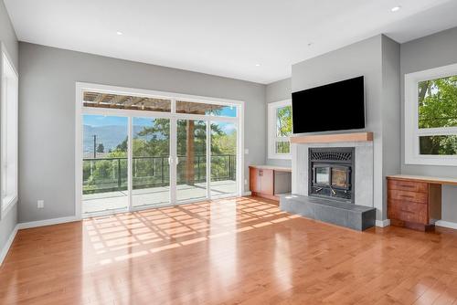 220 West Bench Drive, Penticton, BC - Indoor Photo Showing Living Room With Fireplace