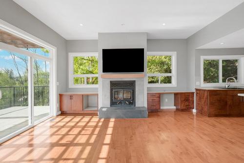 220 West Bench Drive, Penticton, BC - Indoor Photo Showing Living Room With Fireplace