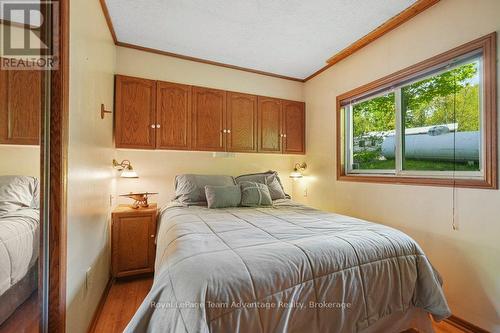 Primary Bedroom - 15 Labrash Lake Road, Whitestone, ON - Indoor Photo Showing Bedroom