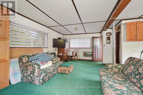 Living room above garage - 15 Labrash Lake Road, Whitestone, ON - Indoor
