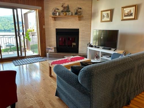 Living room - 2231-128 Rue Pinoteau, Mont-Tremblant, QC - Indoor Photo Showing Living Room With Fireplace