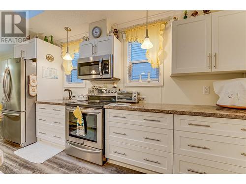 Stainless appliances, skylights overhead. - 1600 43 Avenue Unit# 25, Vernon, BC 