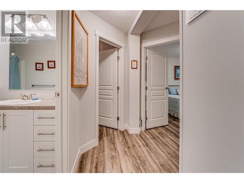 main bathroom left and 2 bedrooms - 1600 43 Avenue Unit# 25, Vernon, BC 