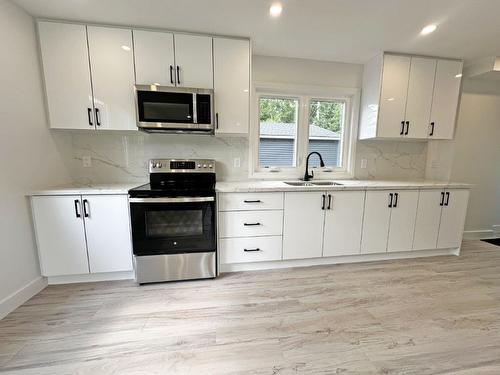 77 Brompton Road, Red Rock, ON - Indoor Photo Showing Kitchen With Double Sink