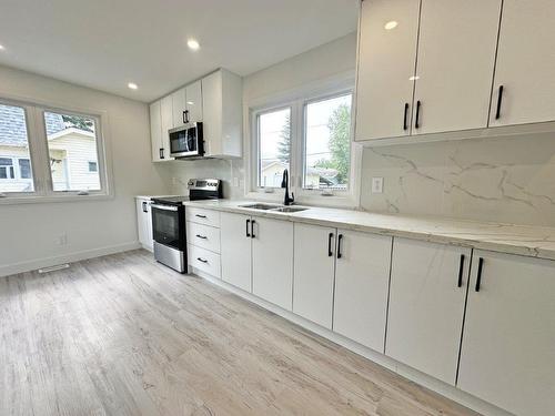 77 Brompton Road, Red Rock, ON - Indoor Photo Showing Kitchen With Double Sink