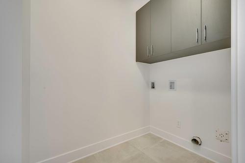 Salle de lavage - 320 Rue Du Bassin, Saint-Jérôme, QC - Indoor Photo Showing Other Room