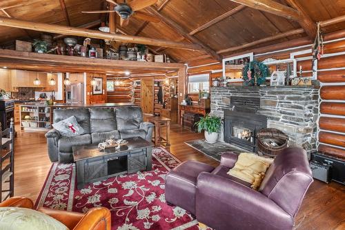 11899 3A Highway, Destiny Bay, BC - Indoor Photo Showing Living Room With Fireplace