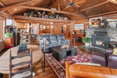 11899 3A Highway, Destiny Bay, BC - Indoor Photo Showing Living Room With Fireplace