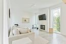 Living room - 145 Ch. Hivernon, Sutton, QC  - Indoor With Fireplace 
