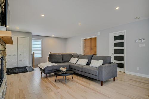 Living room - 416 Ch. De Montfort, Piedmont, QC - Indoor Photo Showing Living Room With Fireplace