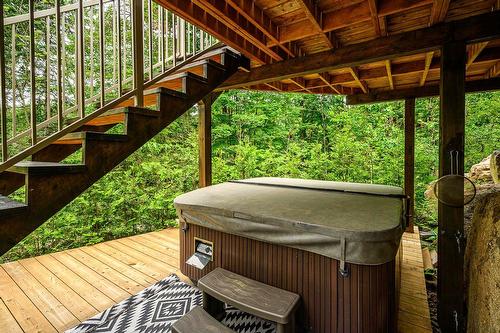 Hot tub - 416 Ch. De Montfort, Piedmont, QC - Outdoor With Deck Patio Veranda With Exterior