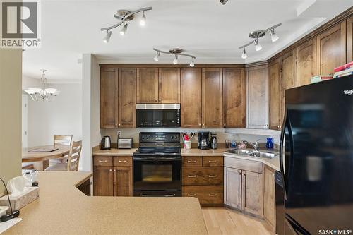 1006 902 Spadina Crescent E, Saskatoon, SK - Indoor Photo Showing Kitchen With Double Sink