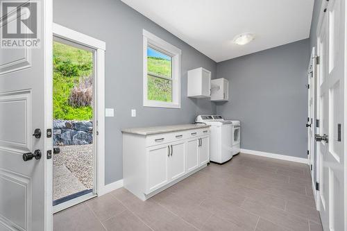 Access to back yard, kitchen and garage from Laundry - 313 Baldy Place, Vernon, BC - Indoor