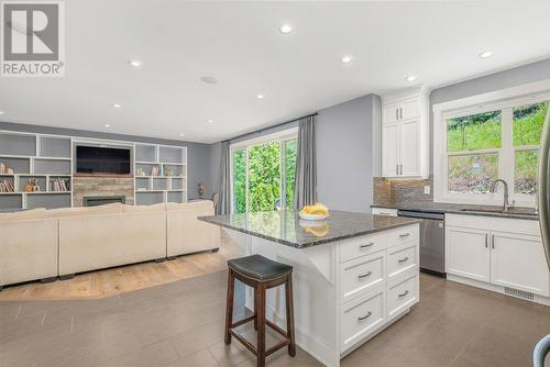 Seamless movement from kitchen to private yard - 313 Baldy Place, Vernon, BC - Indoor Photo Showing Kitchen