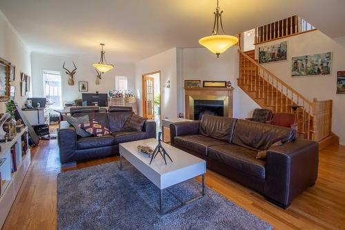 Living room - 49 Rue Des Arbres, Dollard-Des-Ormeaux, QC - Indoor Photo Showing Living Room With Fireplace