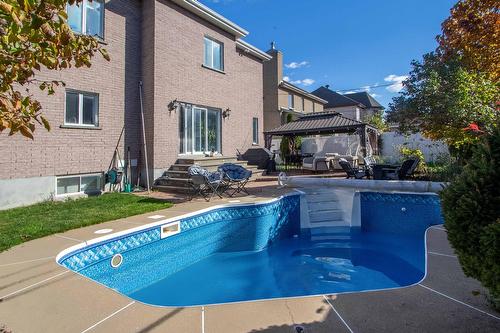 Backyard - 49 Rue Des Arbres, Dollard-Des-Ormeaux, QC - Outdoor With In Ground Pool