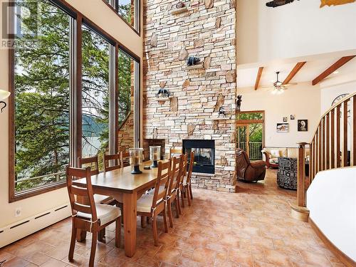 9900 Eastside Road Unit# 9, Vernon, BC - Indoor Photo Showing Dining Room With Fireplace