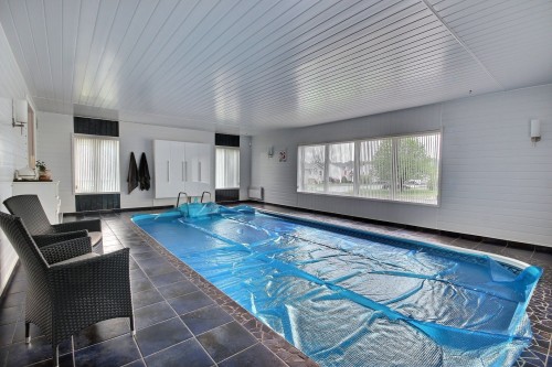 Piscine - 60 Av. Victor, Rouyn-Noranda, QC - Indoor Photo Showing Other Room With In Ground Pool