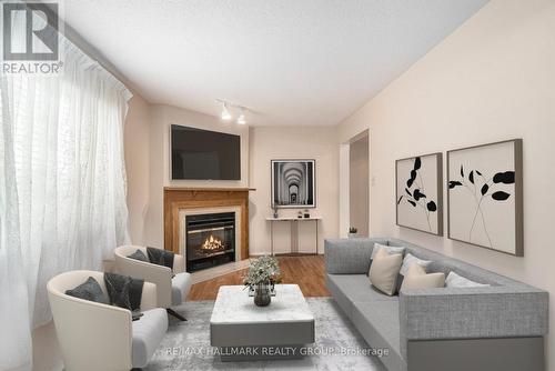 Siting Room with fireplace - 9 Raj Terrace, Ottawa, ON - Indoor Photo Showing Living Room With Fireplace