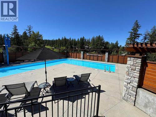 101 Dormie Drive Unit# 4G, Vernon, BC - Outdoor With In Ground Pool With Backyard
