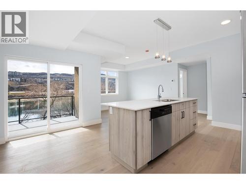 Picture from similar C1 unit plan at Thompson Landing. View of river and elevation slightly different. - 207 Royal Avenue Unit# 505, Kamloops, BC - Indoor Photo Showing Kitchen