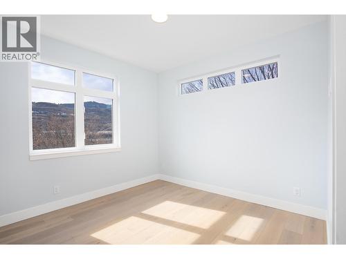 Picture from similar C1 unit plan at Thompson Landing. View of river and elevation slightly different. - 207 Royal Avenue Unit# 505, Kamloops, BC - Indoor Photo Showing Other Room