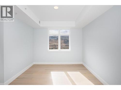 Picture from similar C1 unit plan at Thompson Landing. View of river and elevation slightly different. - 207 Royal Avenue Unit# 505, Kamloops, BC - Indoor Photo Showing Other Room