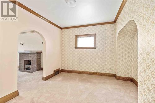 728-730 Wellington St E, Sault Ste. Marie, ON - Indoor Photo Showing Other Room With Fireplace