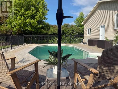 62 Menard Street, Russell, ON - Outdoor With In Ground Pool With Deck Patio Veranda