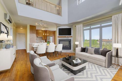 Vue d'ensemble - 706-1180 Ch. D'Aylmer, Gatineau (Aylmer), QC - Indoor Photo Showing Living Room With Fireplace