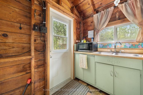 27 Thrush Lane, Prince Edward County, ON - Indoor Photo Showing Kitchen With Double Sink