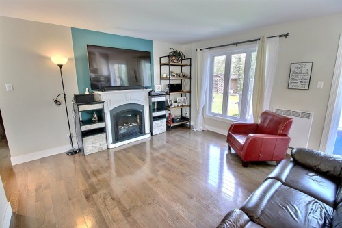 Salon - 562 Route 111, Saint-Marc-De-Figuery, QC - Indoor Photo Showing Living Room With Fireplace