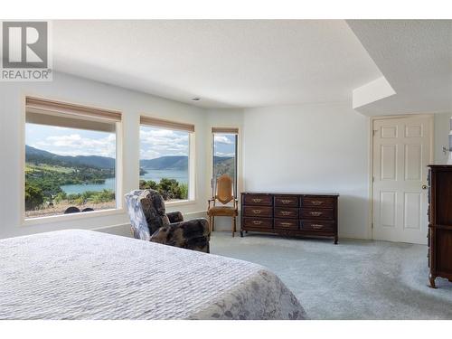 8827 Michael Drive, Coldstream, BC - Indoor Photo Showing Bedroom