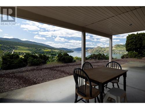 Lower covered patio - 8827 Michael Drive, Coldstream, BC - Outdoor With Deck Patio Veranda With View With Exterior