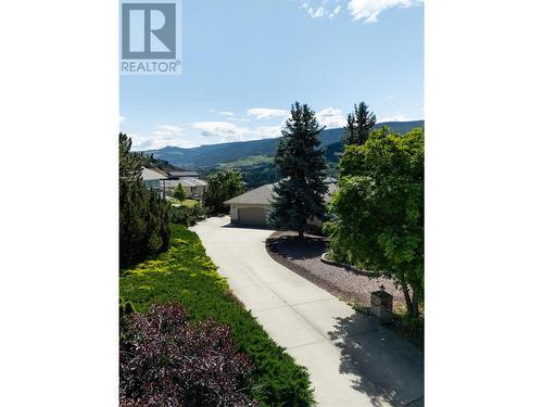 Long tucked in driveway - 8827 Michael Drive, Coldstream, BC - Outdoor With View