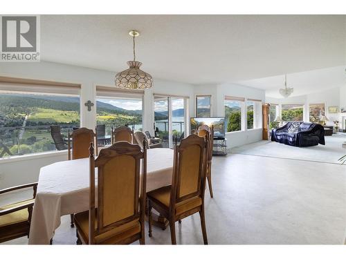 Angle!! - 8827 Michael Drive, Coldstream, BC - Indoor Photo Showing Dining Room
