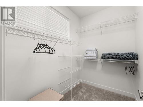 Primary Walk-in Closet - Similar Too - 610 Academy Way Unit# 117, Kelowna, BC - Indoor With Storage