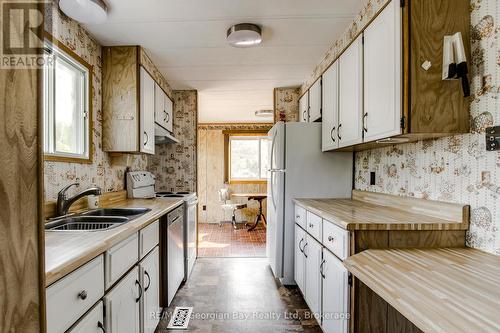 58 - 5263 Elliott Side Road, Tay, ON - Indoor Photo Showing Kitchen With Double Sink