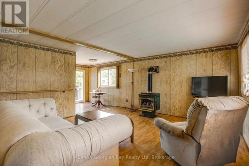 58 - 5263 Elliott Side Road, Tay, ON - Indoor Photo Showing Living Room With Fireplace