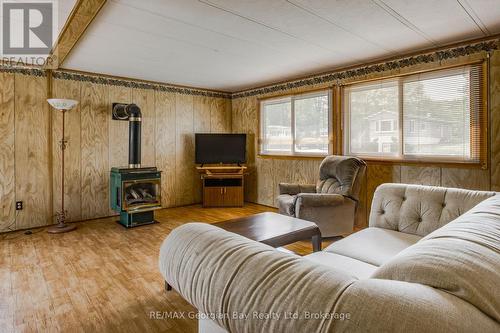 58 - 5263 Elliott Side Road, Tay, ON - Indoor Photo Showing Living Room With Fireplace