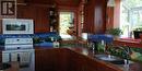 1067 Simmons Road, Creston, BC  - Indoor Photo Showing Kitchen With Double Sink 