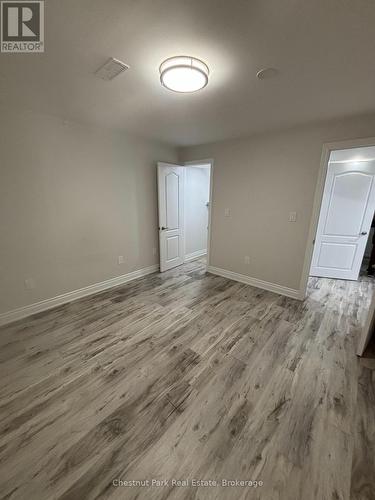 bedroom inlaw suite with closet - 245 Wild Rose Drive, Gravenhurst (Muskoka (S)), ON - Indoor Photo Showing Other Room